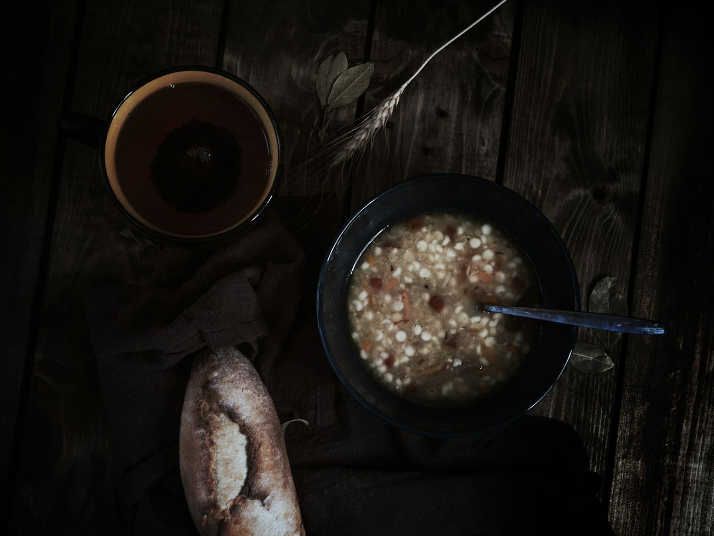Quick white fish with warm butter beans and wilted greens